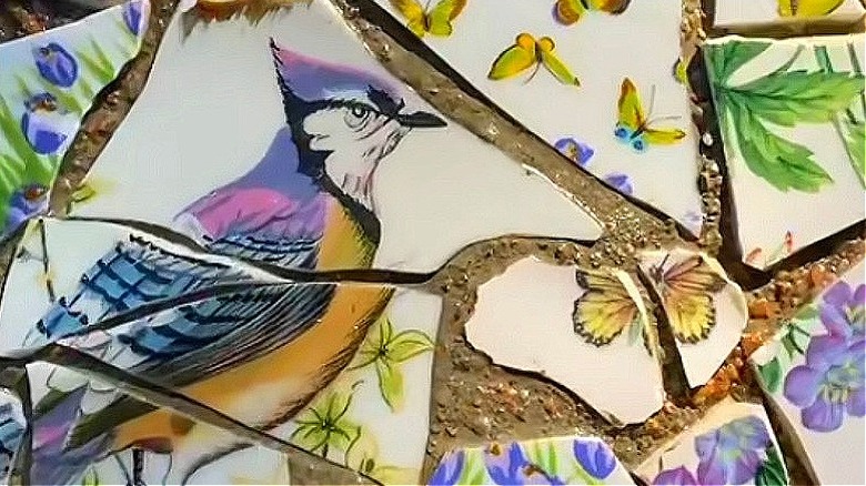DIY mosaic concrete pavers with broken pieces of ceramic