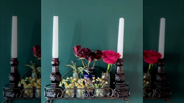 display shelf with glass jar vases