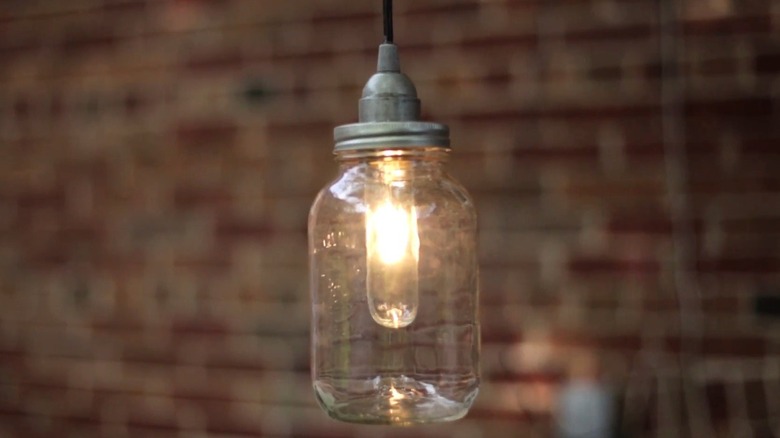 Lantern jar with glowing bulb