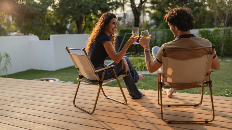 couple having drinks on patio