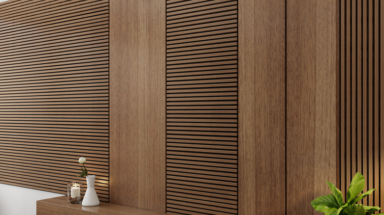 Medium brown cabinets covered in pole wrap.