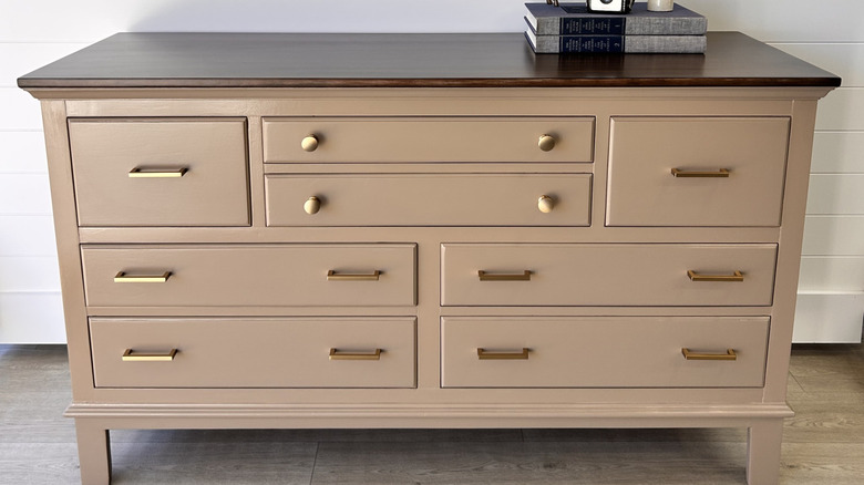 A refinished piece of wooden furniture.