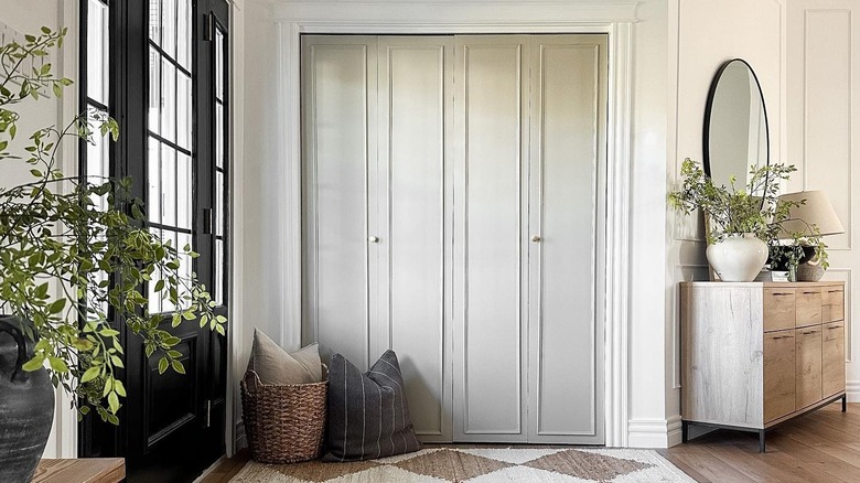 DIY bifold closet doors with new paint and decorative style trim