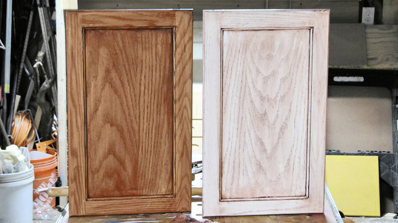 Two cabinet doors with a glazing coat of oil based stain standing side-by-side