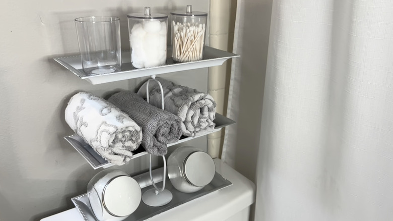 DIY tiered storage on toilet tank