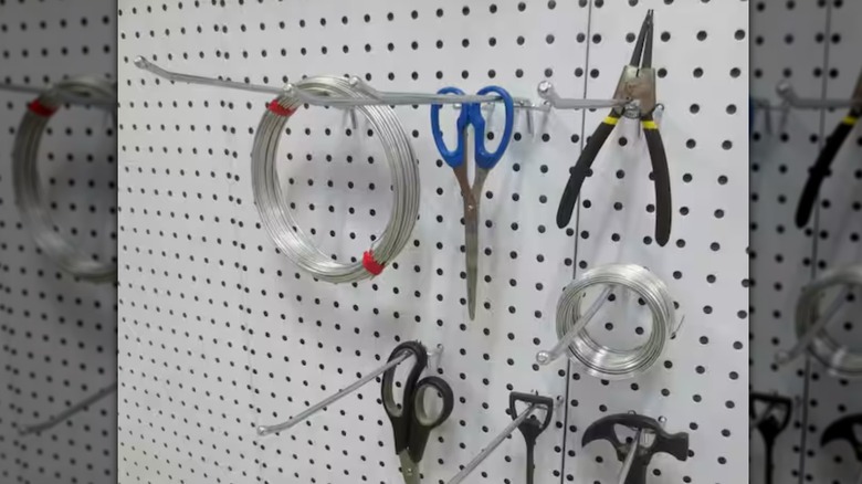 Tools hanging on Everbilt Peg Hooks.