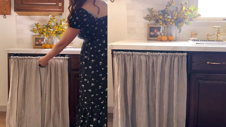 Young woman using dishwasher with vintage pinstripe curtain skirt in front