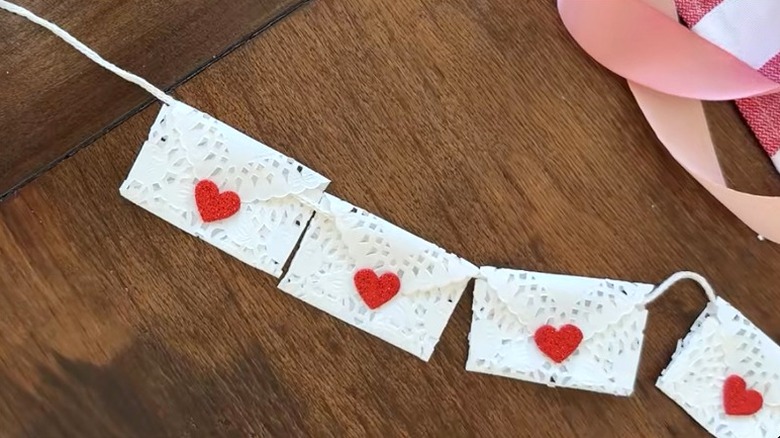 Valentine's Day garland decor made from Dollar Tree heart-shaped doilies