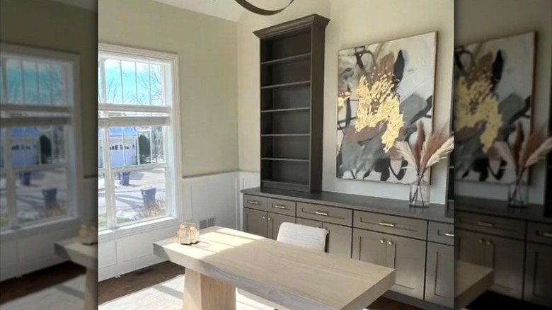 An elegant home office with built-ins made from IKEA Billy bookcases.