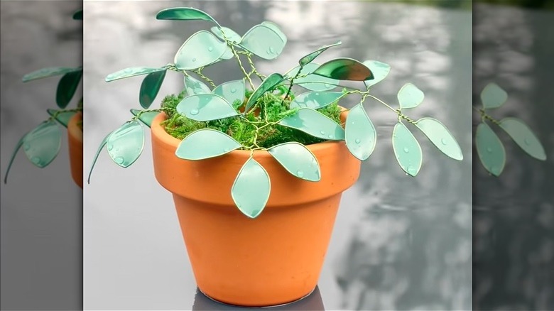 Artificial DIY potted plant decor made from old nail polish and wires