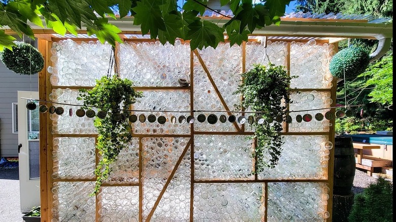 A greenhouse made of upcycled glass jars