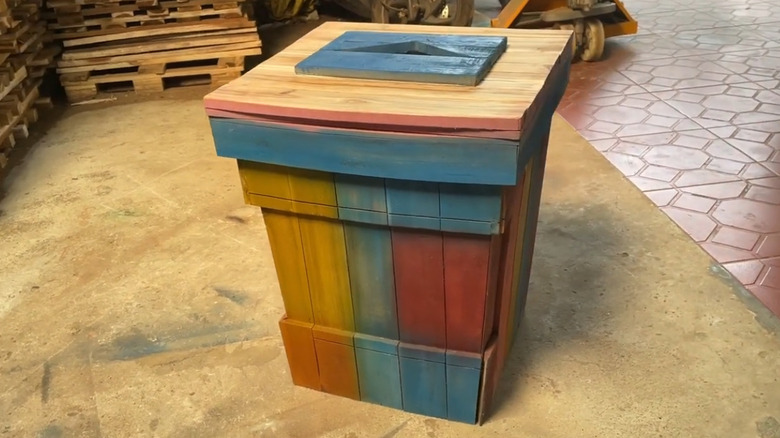 Colorful DIY recycling bin made from old wood pallets