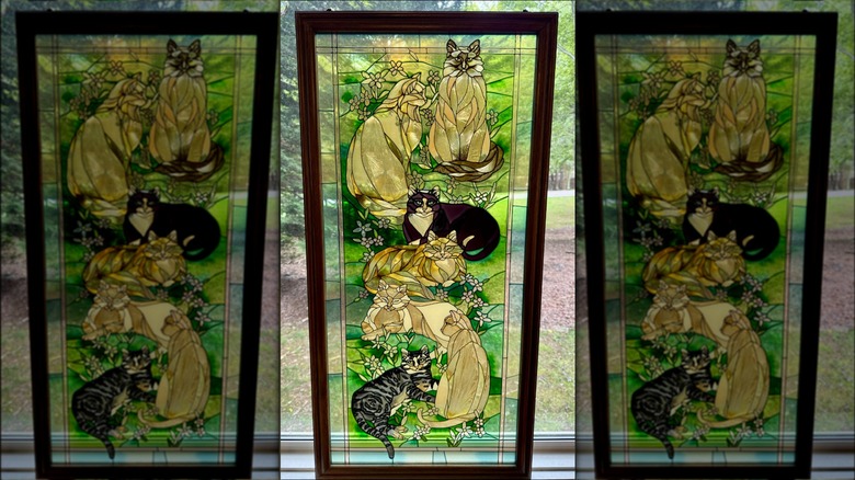 A Joan Baker "Tiffany Cats" Stained Glass panel.