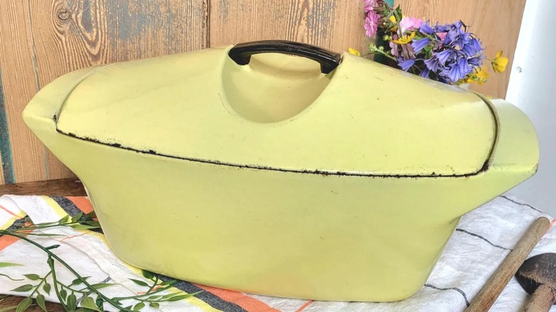 A bright yellow vintage Le Creuset  Coquelle by Raymond Loewy