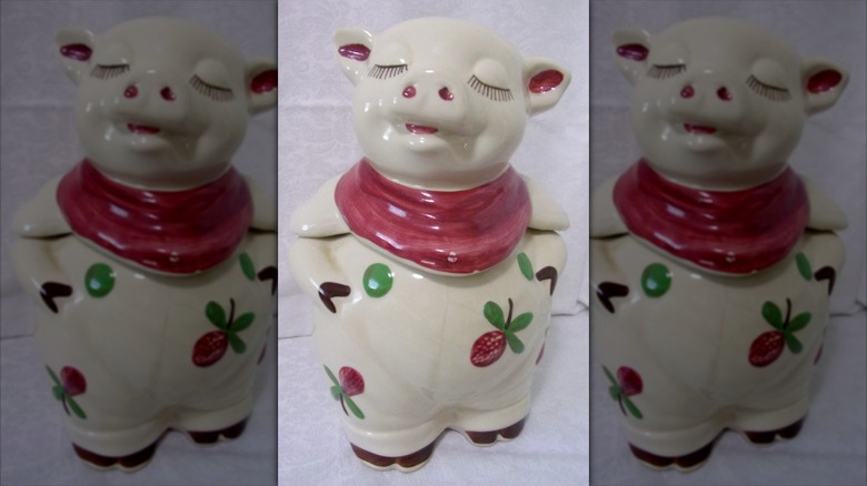 Shawnee Smiley Pig cookie jar with a red scarf and strawberries