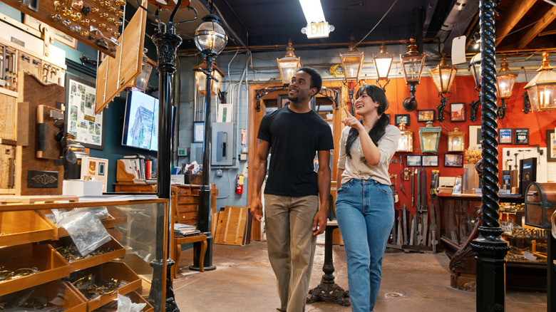 People shopping for decor in an antique shop