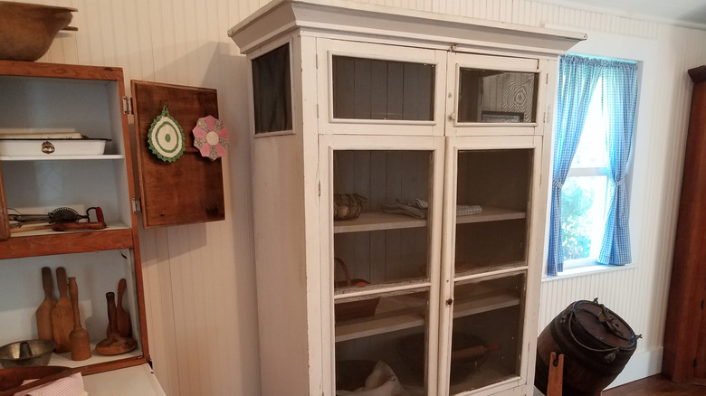 Vintage hutch turned into blanket and quilt storage cabinet