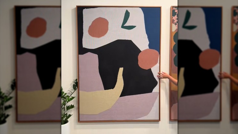 Abstract throw blanket framed as high-end wall art in home