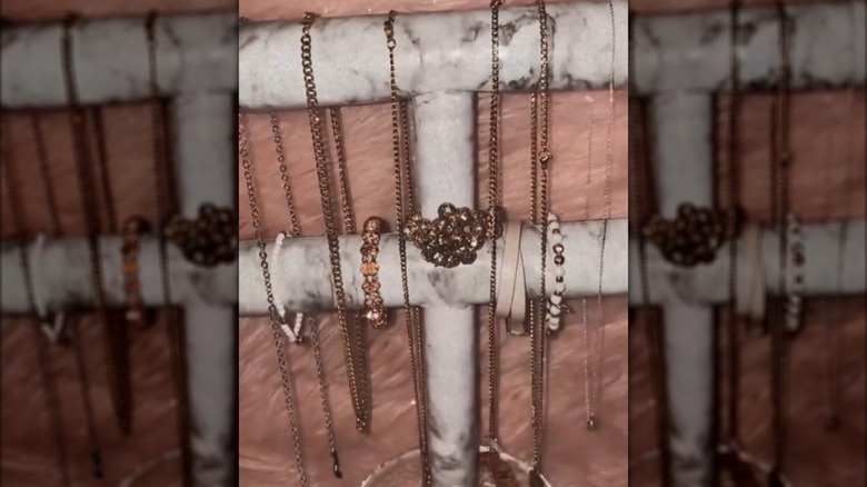 Marbled jewelry display for rings, necklaces, and bracelets made of paper tubes