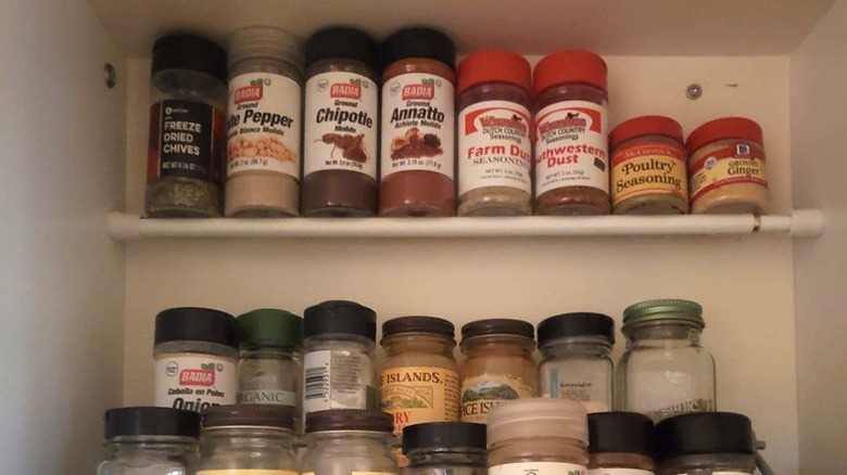 Upgraded spice cabinet with curtain rod hack