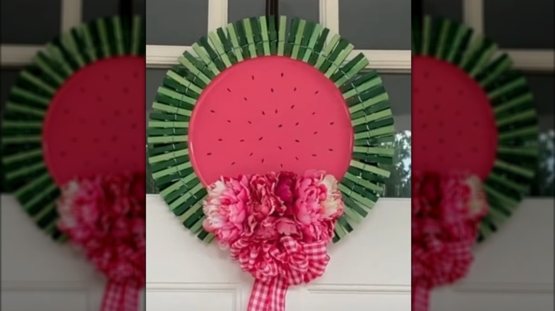 Pizza pan watermelon decoration hanging on a door