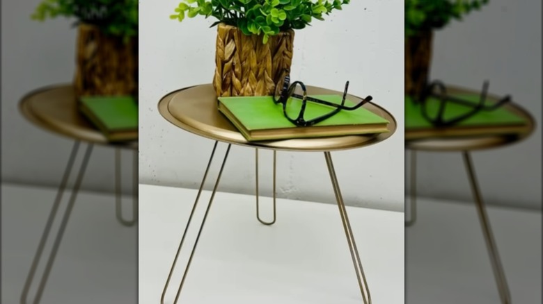Simple stand made from paper towel holders and a pizza pan