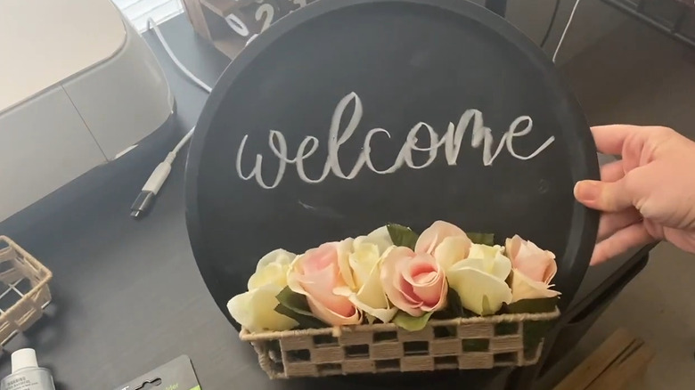 Pizza pan covered with chalkboard paint and decorated with flowers