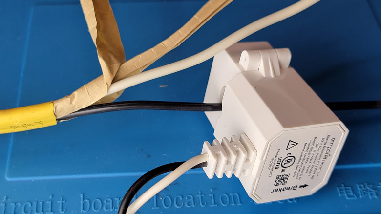 Power monitor sensors clamped on the line wire in a cable