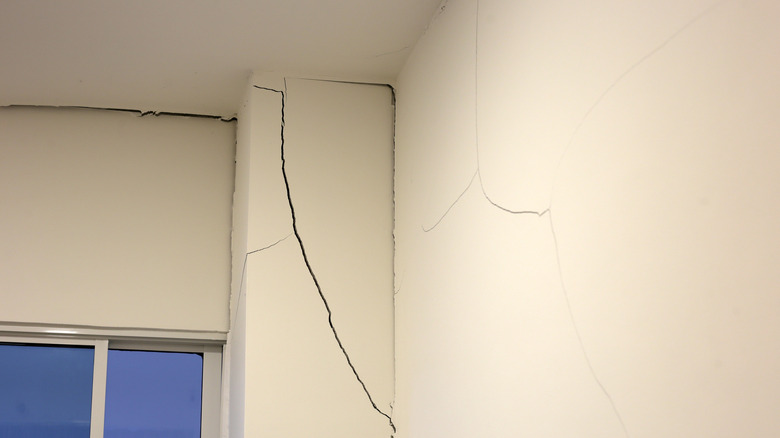 Deep crack on a wall beam.