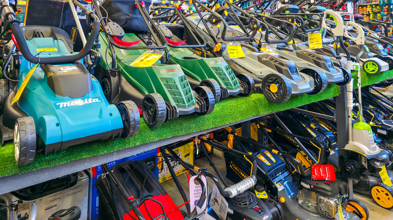 Lawn mowers on sale at a store