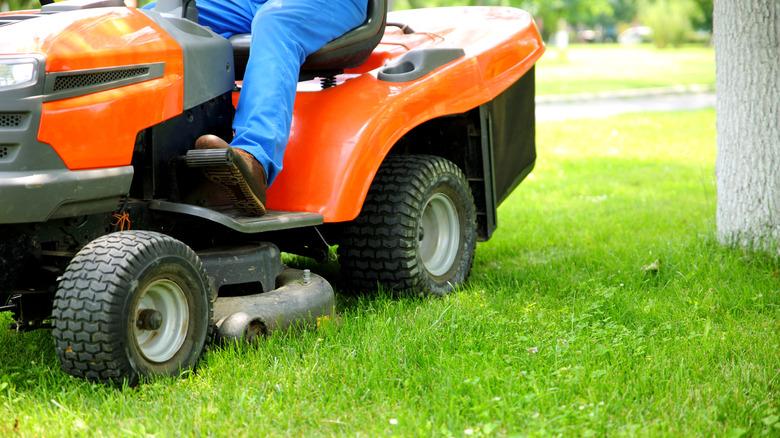 A riding lawn mower on grass