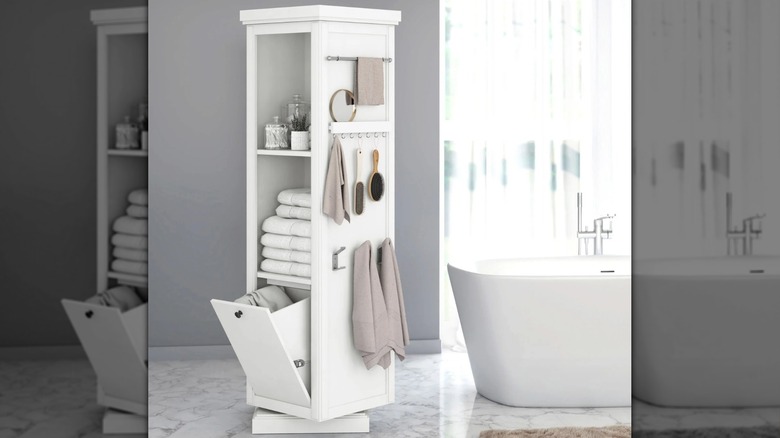 A rotating vanity with multiple storage sections and shelves in a bathroom