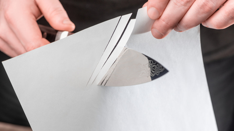 Man performing the paper test.
