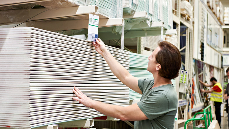 Man shopping for drywall