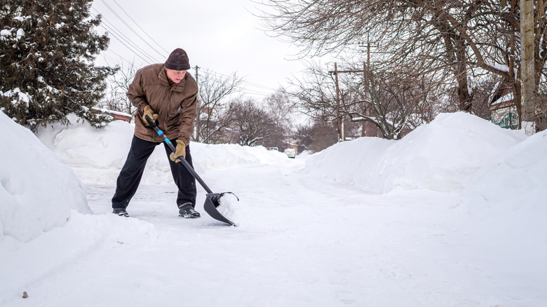 A person shoveling snow