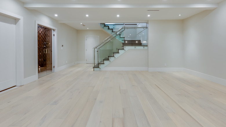 Empty basement in a newly built house with stairs