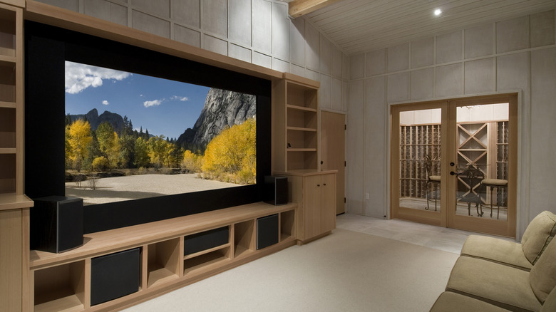 Huge entertainment center with empty shelves