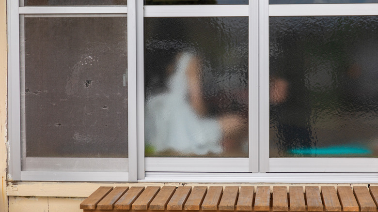 A home's window with frosted glass