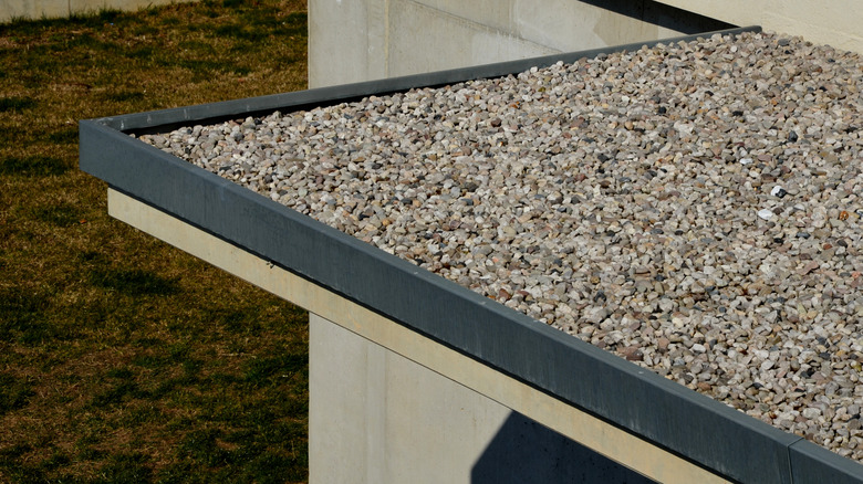 A layer of gravel protecting a flat roof