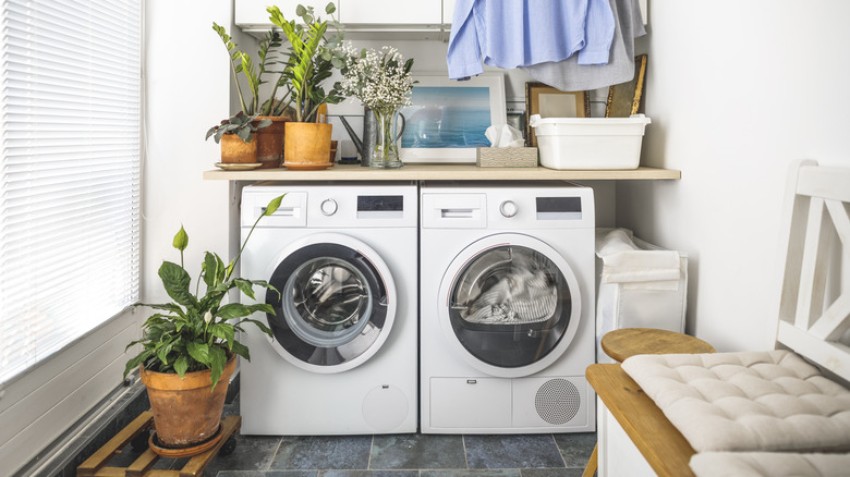 side-by-side washer and dryer set with countertop