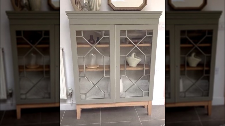 Refinished hutch top with added legs to create a display cabinet