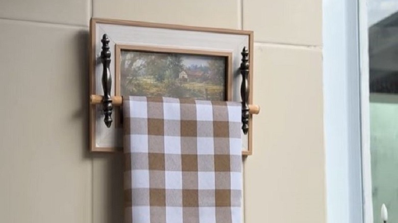 Picture frame and furniture handles turned into DIY towel holder