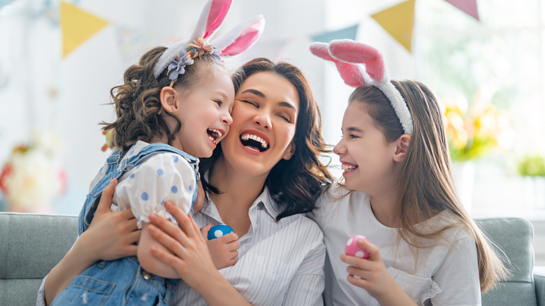 A family wearing bunny ears celebrates easter