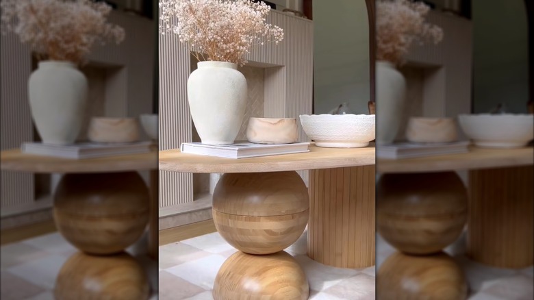 Contemporary wooden table made from various IKEA products with modern chic decor in luxury home