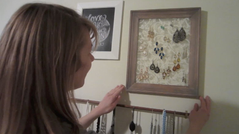 The finished earring holder can be hung on the wall.