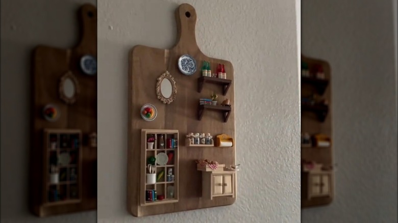 DIY miniature kitchen decor made of dollhouse furniture glued to a cutting board