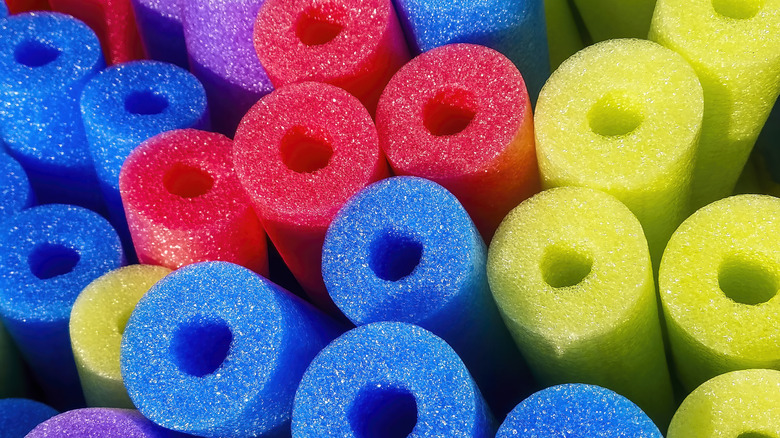 an assortment of colorful pool noodles