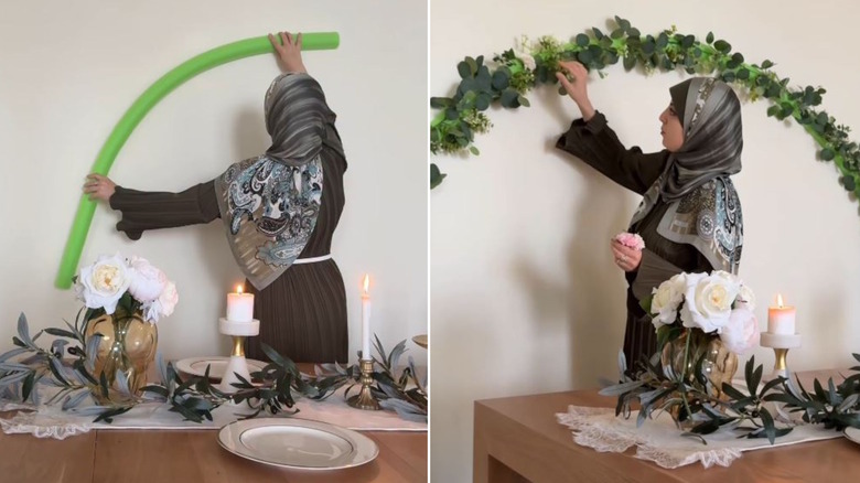Woman making DIY floral arch using pool noodles