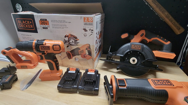 A set of Black and Decker tools next to a box on a table