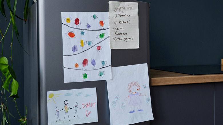 Fridge covered in artwork